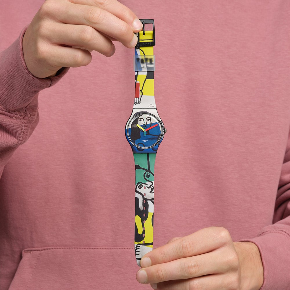 SWATCH LAGER'S TWO WOMEN HOLDING FLOWERS